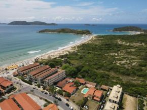 Flat frente mar na Praia do Pero com piscina